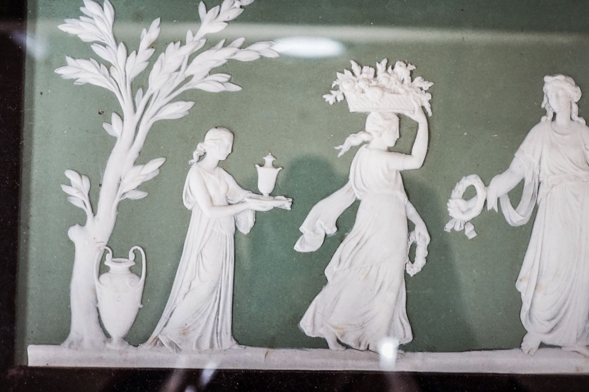 A Wedgwood jasperware plaque, framed. 15x48cm excl. frame